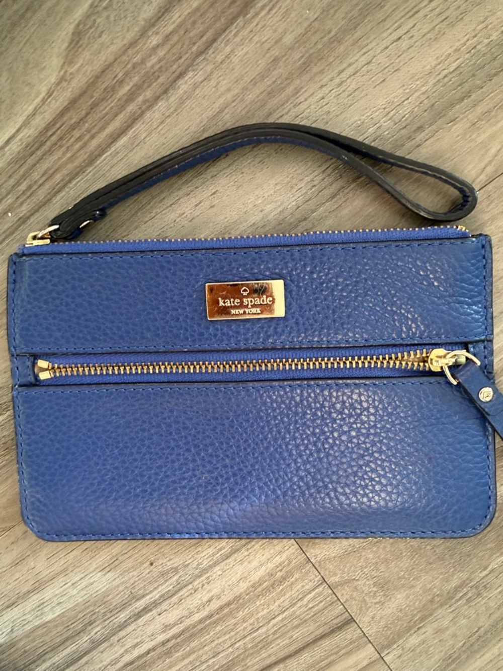 kate spade cobalt blue pebbled leather wristlet with gold hardware
